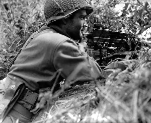 Breakout: Soldier positioned in a ditch with gun Browning