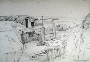31071875: A soldier reading a letter in the trenches