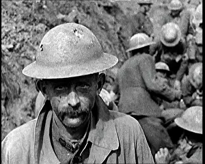Dents: Soldier Showing the Dents In His Helmet