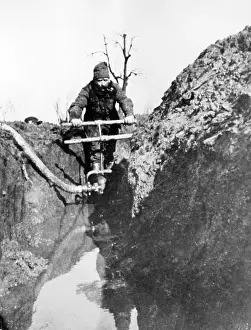 Pumping: Soldier in a trench on the Western Front, WW1