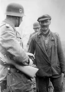 Suspect: Soldier of the Waffen-SS with a partisan, 1942