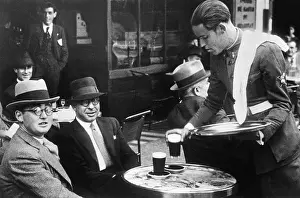 Waiters: Soldier as waiter in Barcelona, 1935