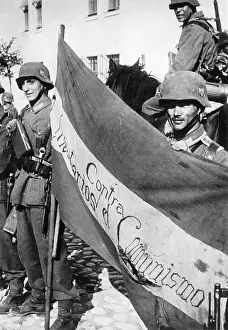 Soldiers of the Blue Division with their flag, 1941