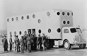 Boarding: Soldiers boarding a white tractor semi-trailer