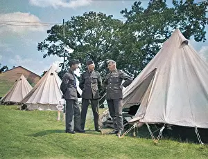 John Maclellan: Three soldiers at a camp