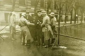 Controlling: Soldiers check passers-by before accessing