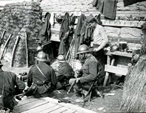 Hooks: Soldiers cleaning their weapons