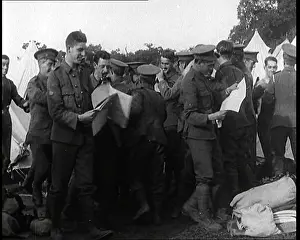 Eagerly: Soldiers Eagerly Receiving Their Copies Of