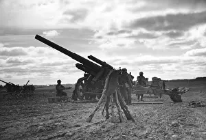 Feldhaubitze: Soldiers with field howitzers, 1938