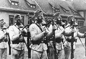 Workwear: Soldiers with gas masks at drill