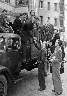 Handed: Soldiers before their journey home at the Condor