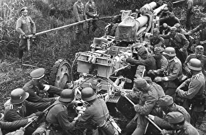 Drag: Soldiers maneuver a gun