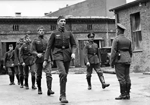 Properly: Soldiers marching, 1936
