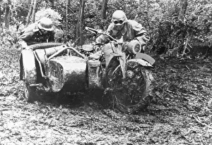 Muddy: Soldiers with their motorcycle on the Eastern Front, 1941