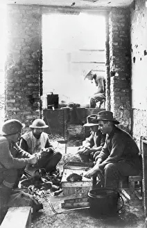 Peeling: Soldiers preparing a meal 1917