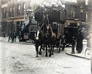 Lambeth: Soldiers riding on the top deck of a London omnibus