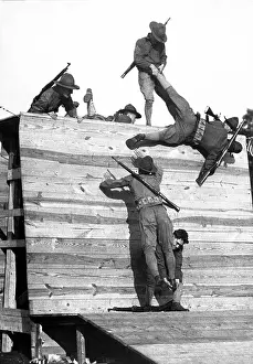 Wadsworth: Soldiers scaling a wall during basic training
