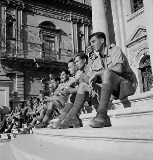 Palermo: Soldiers sitting on the steps of a cathedral