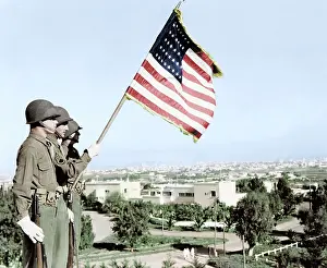 Casablanca: Three soldiers standing with U.S. flag overlooking