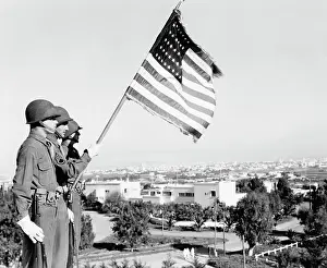 Casablanca: Three soldiers standing with U.S. flag overlooking