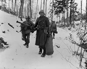 101st: Three soldiers of the U.S. 101st Engineers, held