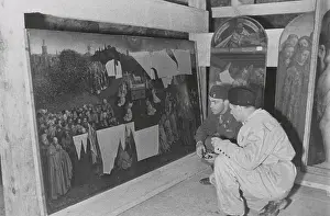 Plundered: Soldiers of U.S. Army MFAA Section examining the