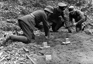 Forth: Soldiers with wooden models at the shooting range, 1932