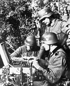 Messages: Soldiers working on the encryption device Enigma