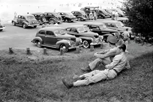 Rear View: Soldiers - World War II - men - beach