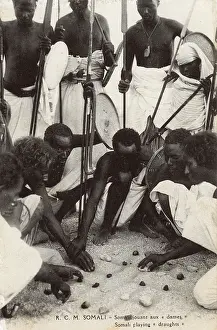 Draughts: Somalian - Somali warriors playing draughts