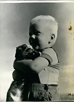 Barlow: Son of co-op farmer with pet cat, Saskatchewan, Canada