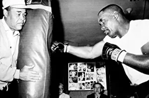 Liston: Sonny Liston working out on the heavy bag ?