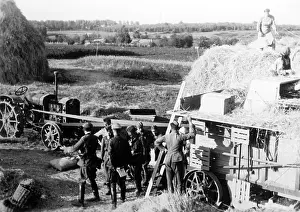 Threshing: Southwest of Kaluga a propelled thresher during threshing