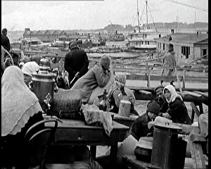 British Pathé Ltd: Soviet Civilians Gathering By the Bank of a River