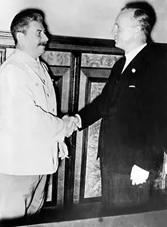 Conclude: Soviet General Secretary Josef Stalin (left), ?