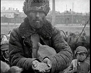 Federative: Soviet Man Holding Grains In His Hands