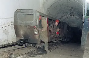 Descends: Soviet mining shift descending, 1991