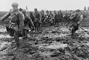 Bsloclcgr: Soviet (Russian) soldiers marching through a muddy