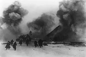 Anatoli: Soviet (Russian) soldiers behind a tank dislodging