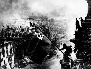 Michail: Soviet soldiers hoisting Soviet flag