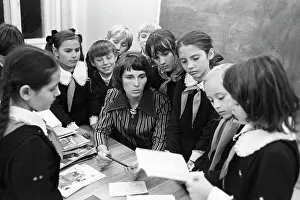 Amur: Soviet teacher surrounded by pupils, 1977