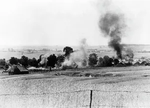 German Soviet: A Soviet village was set on fire during a battle, 1941