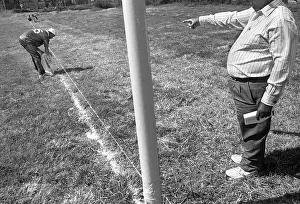 Stomachs: Soweto, 1996 :The fields are marked just before the