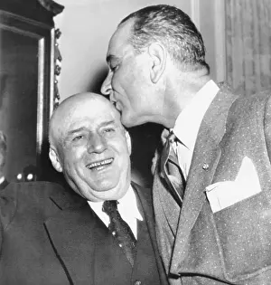 1037: Speaker Sam Rayburn gets a kiss on the head from