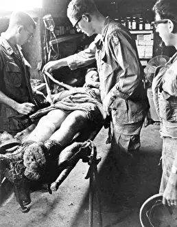 Recovery: Special Forces doctors treat a wounded soldier