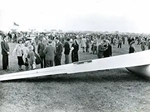Sailplane: Spectators in front of the wing of a Sky Sailplane at th