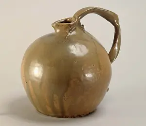 Spherical: Spherical pot with a crooked handle