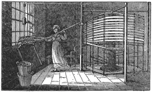Spitalfields: Spitalfields silk worker winding silk onto the