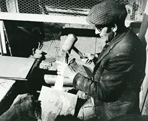 Skilled: Splitting a slate, Penyrorsedd Slate Quarry, North Wales