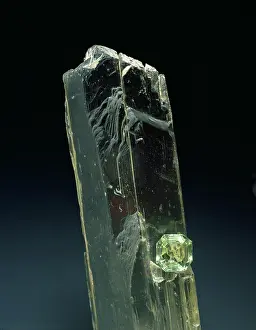 Sparkle: Spodumene crystal and cut stone